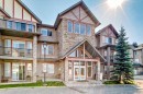 2210-211 Aspen Stone Boulevard Sw, Calgary, AB  - Outdoor With Balcony With Facade 