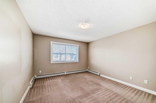 2210-211 Aspen Stone Boulevard Sw, Calgary, AB - Indoor Photo Showing Other Room