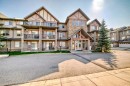 2210-211 Aspen Stone Boulevard Sw, Calgary, AB  - Outdoor With Balcony With Facade 