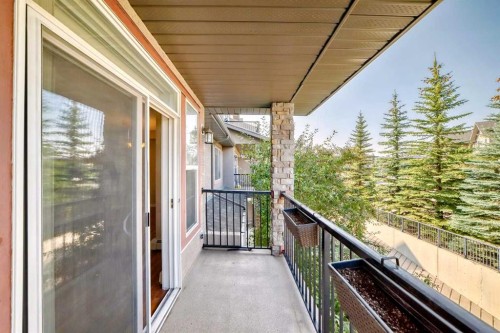 2210-211 Aspen Stone Boulevard Sw, Calgary, AB - Outdoor With Balcony With Exterior