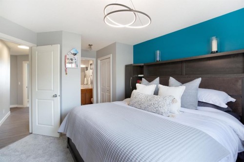 1405-800 Yankee Valley Boulevard Se, Airdrie, AB - Indoor Photo Showing Bedroom