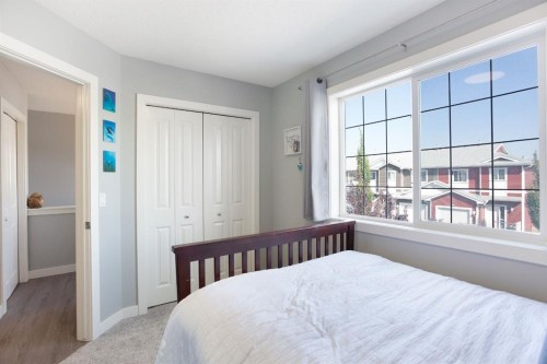 1405-800 Yankee Valley Boulevard Se, Airdrie, AB - Indoor Photo Showing Bedroom