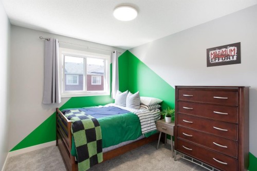 1405-800 Yankee Valley Boulevard Se, Airdrie, AB - Indoor Photo Showing Bedroom