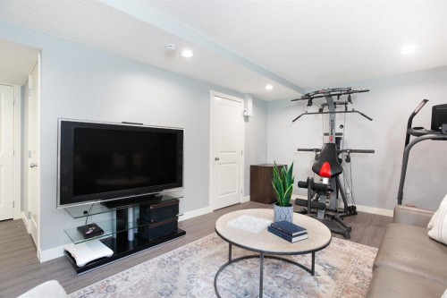 1405-800 Yankee Valley Boulevard Se, Airdrie, AB - Indoor Photo Showing Living Room