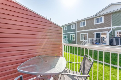 1405-800 Yankee Valley Boulevard Se, Airdrie, AB - Outdoor With Deck Patio Veranda With Exterior