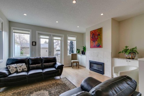 2018B 26A Street Sw, Calgary, AB - Indoor Photo Showing Living Room With Fireplace