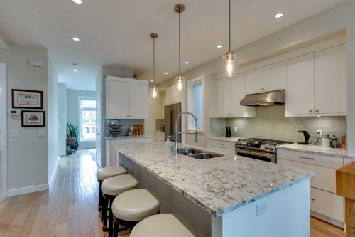 2018B 26A Street Sw, Calgary, AB - Indoor Photo Showing Kitchen With Double Sink With Upgraded Kitchen