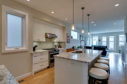 2018B 26A Street Sw, Calgary, AB - Indoor Photo Showing Kitchen With Double Sink With Upgraded Kitchen