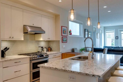 2018B 26A Street Sw, Calgary, AB - Indoor Photo Showing Kitchen With Double Sink With Upgraded Kitchen