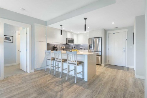 227-15 Aspenmont Heights Sw, Calgary, AB - Indoor Photo Showing Other Room