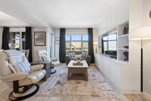 227-15 Aspenmont Heights Sw, Calgary, AB - Indoor Photo Showing Living Room