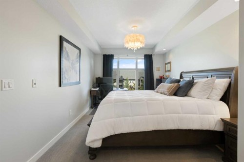 227-15 Aspenmont Heights Sw, Calgary, AB - Indoor Photo Showing Bedroom
