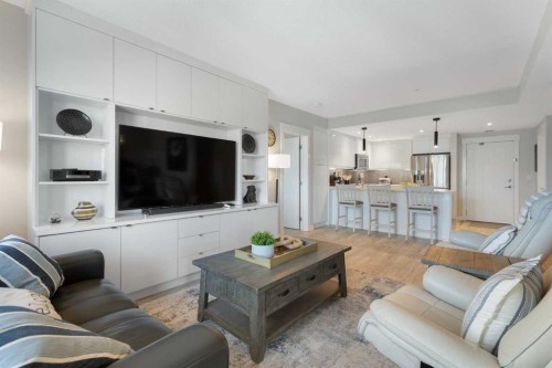 227-15 Aspenmont Heights Sw, Calgary, AB - Indoor Photo Showing Living Room