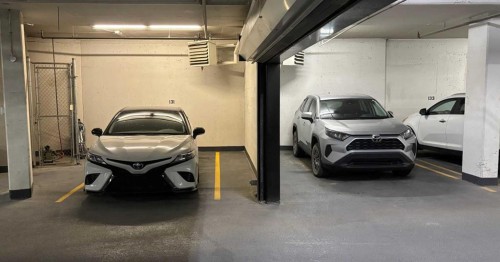 227-15 Aspenmont Heights Sw, Calgary, AB - Indoor Photo Showing Garage