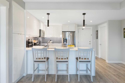 227-15 Aspenmont Heights Sw, Calgary, AB - Indoor Photo Showing Kitchen With Upgraded Kitchen