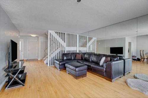 33-228 Theodore Place Nw, Calgary, AB - Indoor Photo Showing Living Room