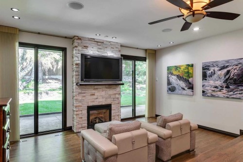 40 Eagle Ridge Place Sw, Calgary, AB - Indoor Photo Showing Living Room With Fireplace