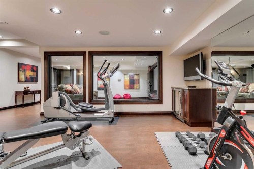 40 Eagle Ridge Place Sw, Calgary, AB - Indoor Photo Showing Gym Room