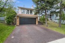 212 Woodbine Boulevard Sw, Calgary, AB  - Outdoor With Facade 
