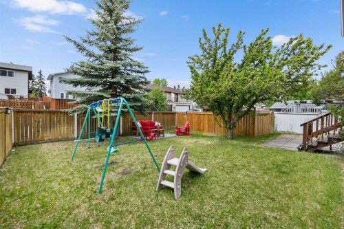 212 Woodbine Boulevard Sw, Calgary, AB - Outdoor With Backyard