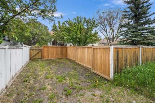 212 Woodbine Boulevard Sw, Calgary, AB - Outdoor With Backyard