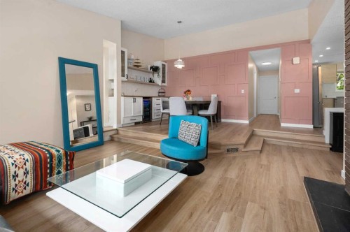 212 Woodbine Boulevard Sw, Calgary, AB - Indoor Photo Showing Living Room