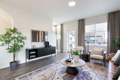 404-1750 Rangeview Drive Se, Calgary, AB - Indoor Photo Showing Living Room
