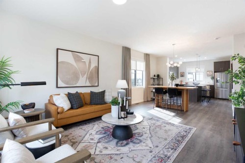 404-1750 Rangeview Drive Se, Calgary, AB - Indoor Photo Showing Living Room