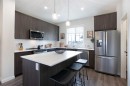 404-1750 Rangeview Drive Se, Calgary, AB  - Indoor Photo Showing Kitchen With Stainless Steel Kitchen With Upgraded Kitchen 