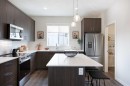404-1750 Rangeview Drive Se, Calgary, AB  - Indoor Photo Showing Kitchen With Upgraded Kitchen 