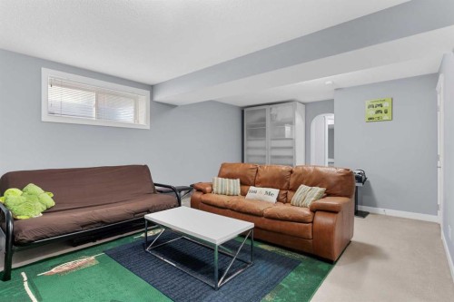 172 Evanspark Gardens Nw, Calgary, AB - Indoor Photo Showing Living Room