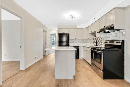321-103 Strathaven Drive, Strathmore, AB - Indoor Photo Showing Kitchen