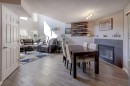 246 Arbour Grove Close Nw, Calgary, AB  - Indoor Photo Showing Dining Room With Fireplace 