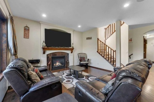 126 Tuscany Summit Heath Nw, Calgary, AB - Indoor With Fireplace