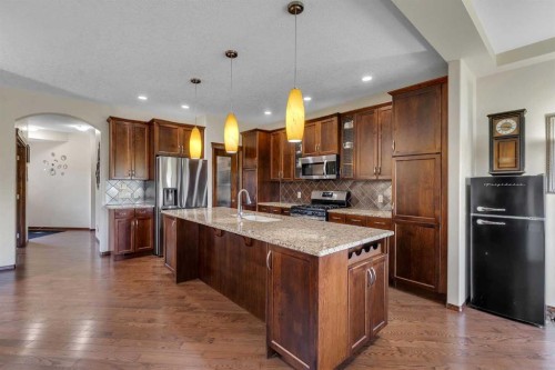 126 Tuscany Summit Heath Nw, Calgary, AB - Indoor Photo Showing Kitchen With Upgraded Kitchen