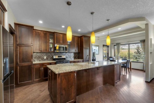 126 Tuscany Summit Heath Nw, Calgary, AB - Indoor Photo Showing Kitchen With Upgraded Kitchen