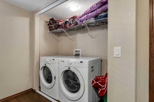 126 Tuscany Summit Heath Nw, Calgary, AB - Indoor Photo Showing Laundry Room