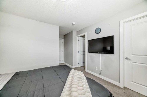 63 Legacy Path Se, Calgary, AB - Indoor Photo Showing Bedroom