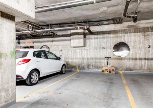 308-8604 48 Avenue Nw, Calgary, AB - Indoor Photo Showing Garage