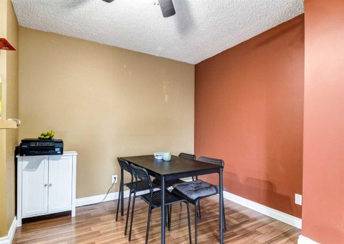 308-8604 48 Avenue Nw, Calgary, AB - Indoor Photo Showing Dining Room