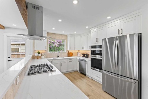 611 Agate Crescent Se, Calgary, AB - Indoor Photo Showing Kitchen With Stainless Steel Kitchen
