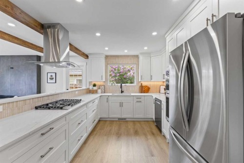 611 Agate Crescent Se, Calgary, AB - Indoor Photo Showing Kitchen With Stainless Steel Kitchen With Upgraded Kitchen