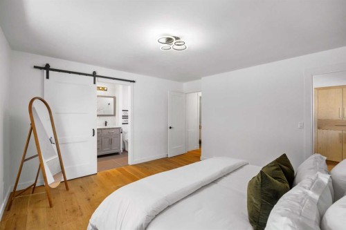 1040 Lake Ontario Drive Se, Calgary, AB - Indoor Photo Showing Bedroom