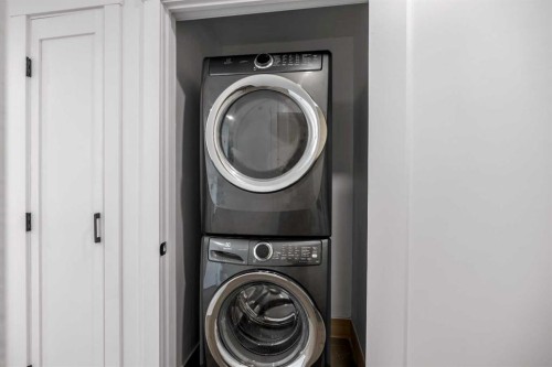 1040 Lake Ontario Drive Se, Calgary, AB - Indoor Photo Showing Laundry Room