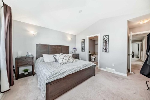55 Baysprings Way Sw, Airdrie, AB - Indoor Photo Showing Bedroom