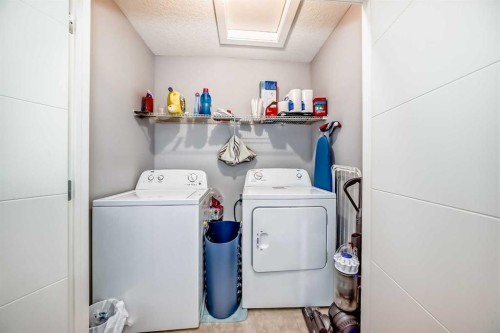 55 Baysprings Way Sw, Airdrie, AB - Indoor Photo Showing Laundry Room