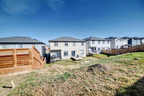 55 Baysprings Way Sw, Airdrie, AB - Outdoor With Backyard With Exterior