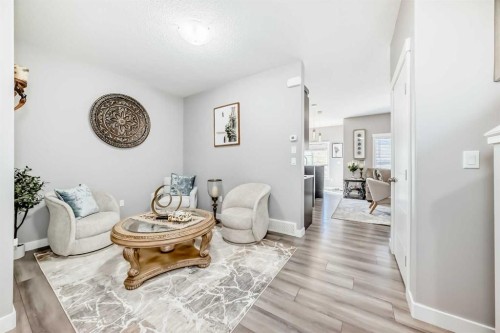 55 Baysprings Way Sw, Airdrie, AB - Indoor Photo Showing Living Room