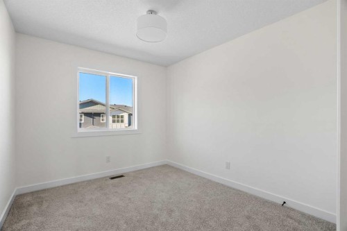 1604-525 River Heights Drive, Cochrane, AB - Indoor Photo Showing Other Room