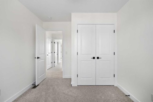 1604-525 River Heights Drive, Cochrane, AB - Indoor Photo Showing Other Room